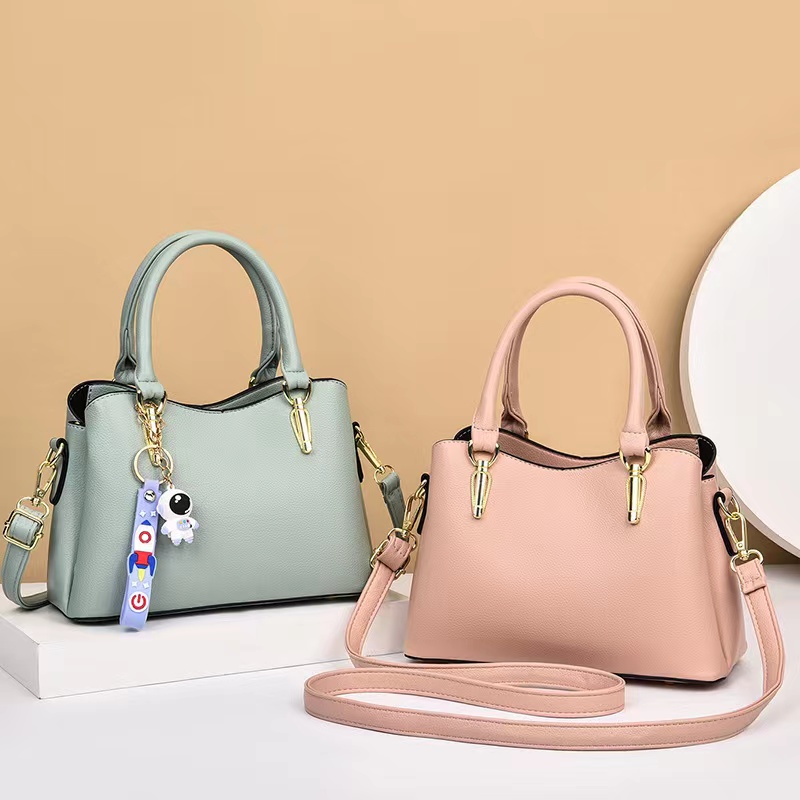 2023 New Fashion Women's PU Leather Large Capacity One Shoulder Oblique Straddle Bag Fashion Pendant Mother Bag